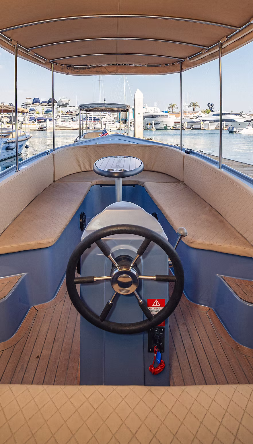 Guests aboard a Little Lido boat in Newport Harbor